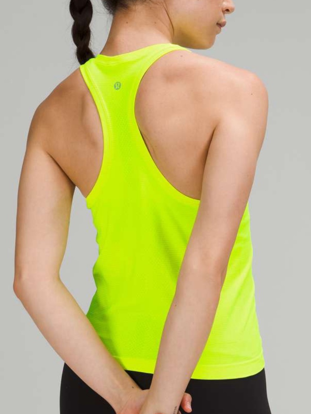 Lululemon Swiftly Tech Racerback 2.0 tank top in a neon yellow color, Size 4